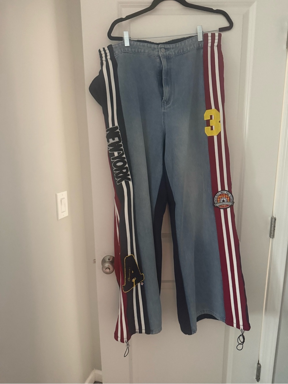 AKIRA LIGHTS OUT TWO-IN-ONE JEANS